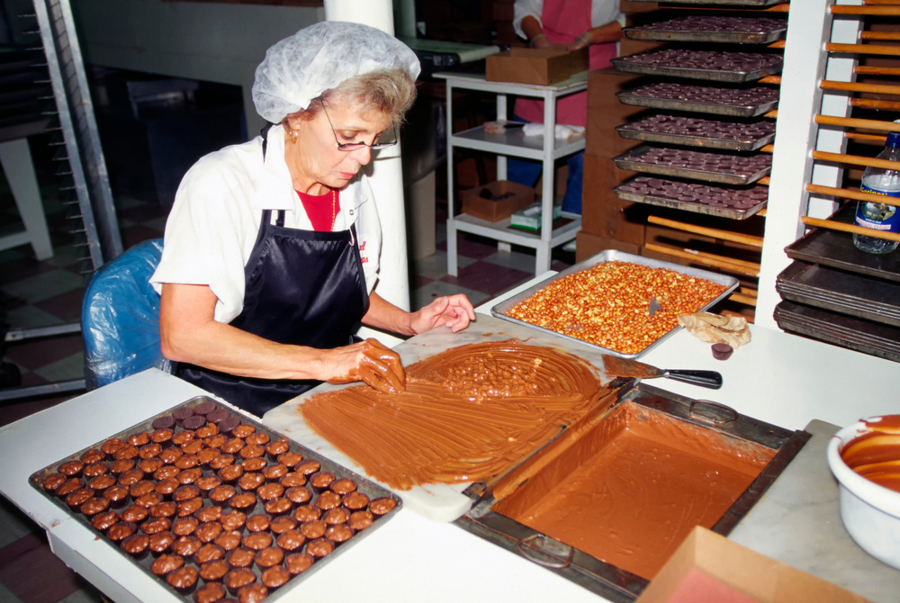 Woman making chocolate in a chocolate factory