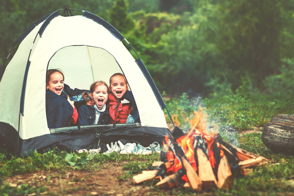 Kids camping in a tent